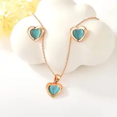 VERAMOREST - Set Aretes Y Collar Dorado Corazón Azul.-