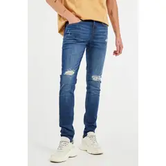 KOAJ - Jean súper skinny azul oscuro con tiro bajo y rotos en fr HOMBRE