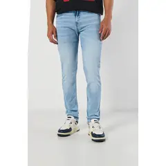 KOAJ - Jean azul claro tipo slim con desgastes y tiro bajo Hombre