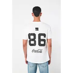KOAJ - Camiseta cuello redondo crema con diseños de Coca-Cola