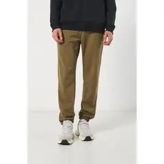 KOAJ - Pantalón jogger unicolor con elástico en bota y bolsillos HOMBRE