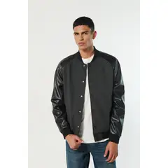 KOAJ - Chaqueta bomber negra ajustada con manga ranglan HOMBRE