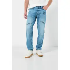 KOAJ - Jean slim azul claro tiro bajo con rotos y diseños HOMBRE