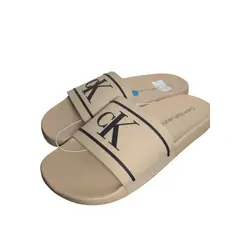 CALVIN KLEIN - Chancleta beige con monograma en relieve carina