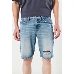 KOAJ - Bermuda tiro bajo azul slim en jean con rotos en frente Hombre