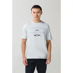 KOAJ - Camiseta en algodón azul college con cuello redondo Hombre