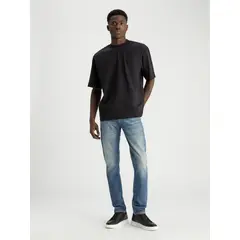 CALVIN KLEIN - Jeans azul slim taper moderno