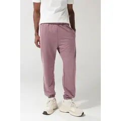 KOAJ - Pantalón unicolor jogger con elástico en bota y bolsill Hombre