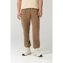 KOAJ - Pantalón jogger unicolor con elástico en bota y bolsill Hombre