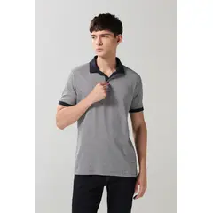 KOAJ - Camiseta polo azul intensa con cuello y puños en contra Hombre