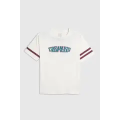 KOAJ - Camiseta college crema en algodón oversize cuello redon Niño