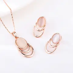 VERAMOREST - Set de Joyería Collar y Aretes con Piedra Oval en Oro Rosa