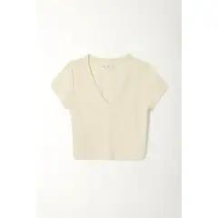 TENNIS - Camiseta crop con cuello en V amarilla para mujer