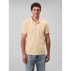 CALVIN KLEIN - Polo amarillo con monograma bordado