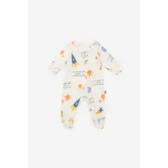 NATO - Pijama Básica Colección La Magia de Ser color crema con estampado en cohetes y frase