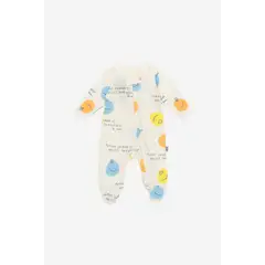 NATO - Pijama Básica Colección La Magia de Ser color crema con estampado en caritas y frase