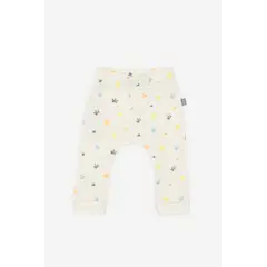 NATO - Pantalón para bebé color blanco con estampado en hojas multicolor marca