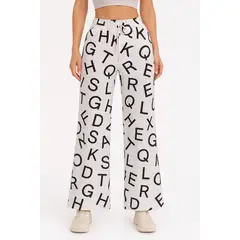 YOGA & GYM - Pantalon Palazzo Ancho Estampado Letras
