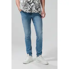 KOAJ - Jean skinny azul medio con desgastes, tiro bajo y bolsi Hombre
