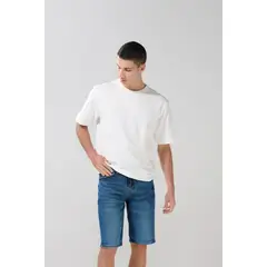 KOAJ - Bermuda de jean slim azul oscura con rotos en frente Hombre