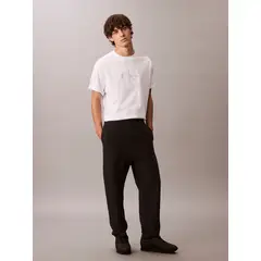 CALVIN KLEIN - Jogger negro en tejido terry premium con monograma bordado