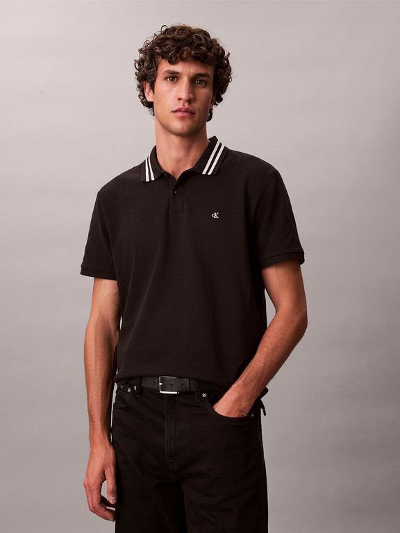 Imagen de Polo negro de piqué con ribetes en contraste