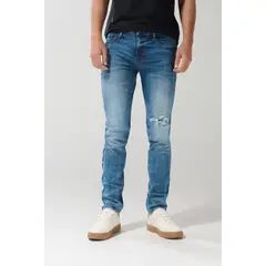 KOAJ - Jean azul claro slim con rotos en frente y tiro bajo Hombre