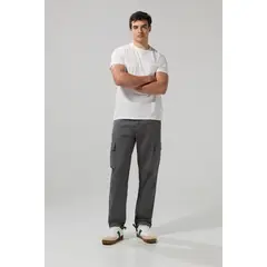 KOAJ - Pantalón unicolor cargo en dril con botas ajustables Hombre