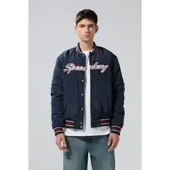 KOAJ - Chaqueta arte college y manga en contraste Hombre