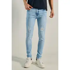 KOAJ - Jean skinny azul claro con rotos delanteros y tiro baj Hombre