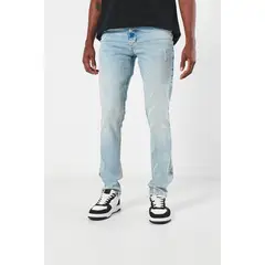 KOAJ - Jean skinny azul claro con rotos sutiles y tiro bajo Hombre