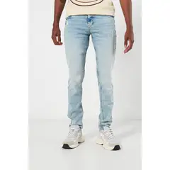 KOAJ - Jean tiro bajo skinny azul claro con rotos sutiles en Hombre