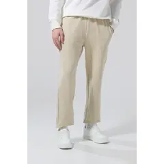 KOAJ - Pantalón unicolor jogger con bolsillos y elásticos Hombre