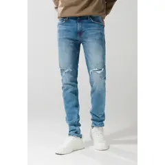 KOAJ - Jean slim azul oscuro con tiro bajo, rotos y desgastes Hombre