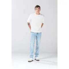 KOAJ - Jean azul claro slim con desgastes, tiro bajo y fit ceñ Hombre