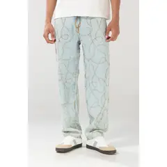 KOAJ - Jean loose azul claro con tiro medio y diseños Hombre