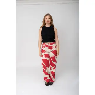 LOCAL ATELIER - Jean wide leg, estampado beige con pimentones rojos