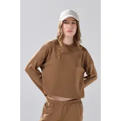 KOAJ - Buzo cuello redondo unicolor oversize en tela texturiza Mujer