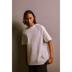 KOAJ - Camiseta oversize unicolor con texto y manga ranglan Hombre