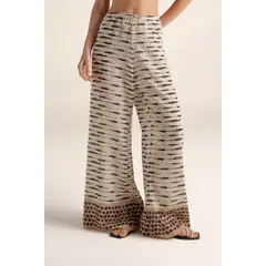 TOUCHE BALNEAIRE - Pantalón en tela estampada de lunares y líneas bota amplia Ref. 0A46062