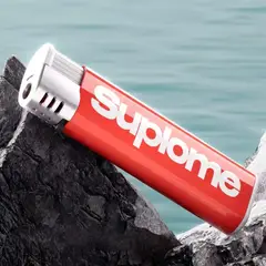 007PLUS - Encendedor de Broma Pistola de Agua Antiestrés