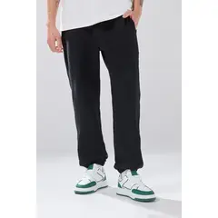 KOAJ - Pantalón unicolor tipo jogger con bolsillos laterales Hombre