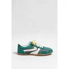 KOAJ - Tenis unicolores tipo casuales con cortes y cordones Mujer
