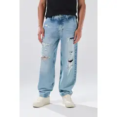 KOAJ - Jean skater azul claro con rotos y tiro medio Hombre
