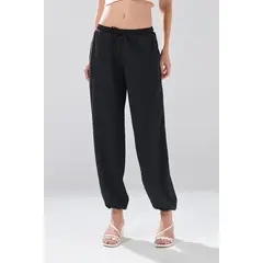 KOAJ - Pantalón balloon cargo negro con tiro medio y bolsillos Mujer