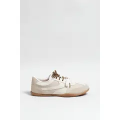 KOAJ - Tenis unicolores tipo casuales con cortes y cordones Mujer