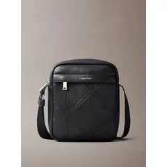 CALVIN KLEIN - Bolso negro reporter con textura integral de emblema