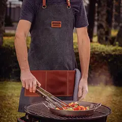 TRAMONTINA - Delantal Churrasco negro en tela y piel sintética